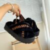 UGG sheepskin and fur slippers with black stripes